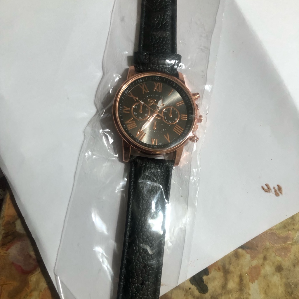 Black And Rose Gold Watch